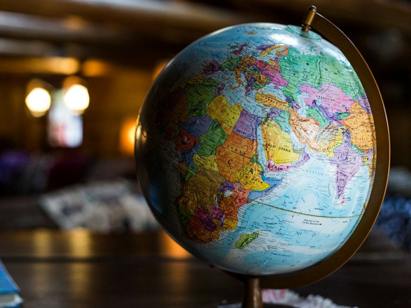 Desk globe showing Africa, the Middle East and Asia, illustrating a comparison of family office locations