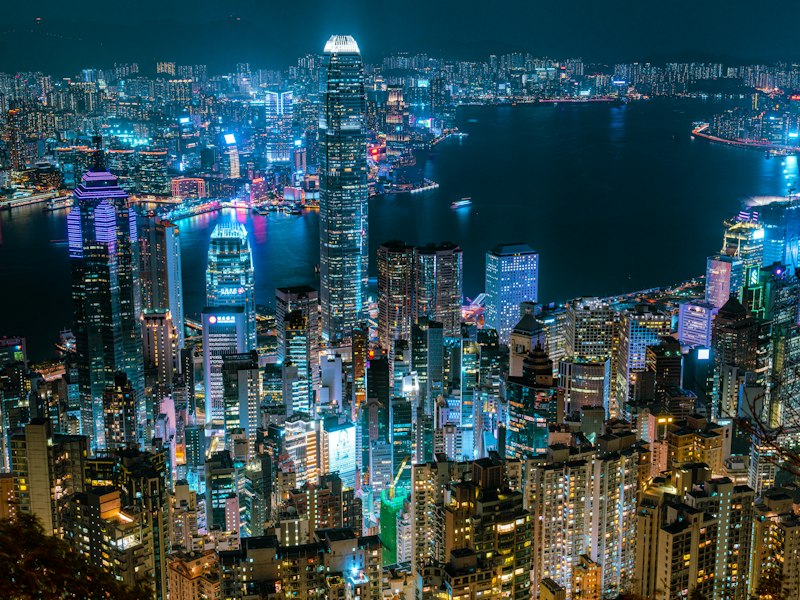 The illuminated Hong Kong skyline and Victoria Harbour at night, viewed from Victoria Peak